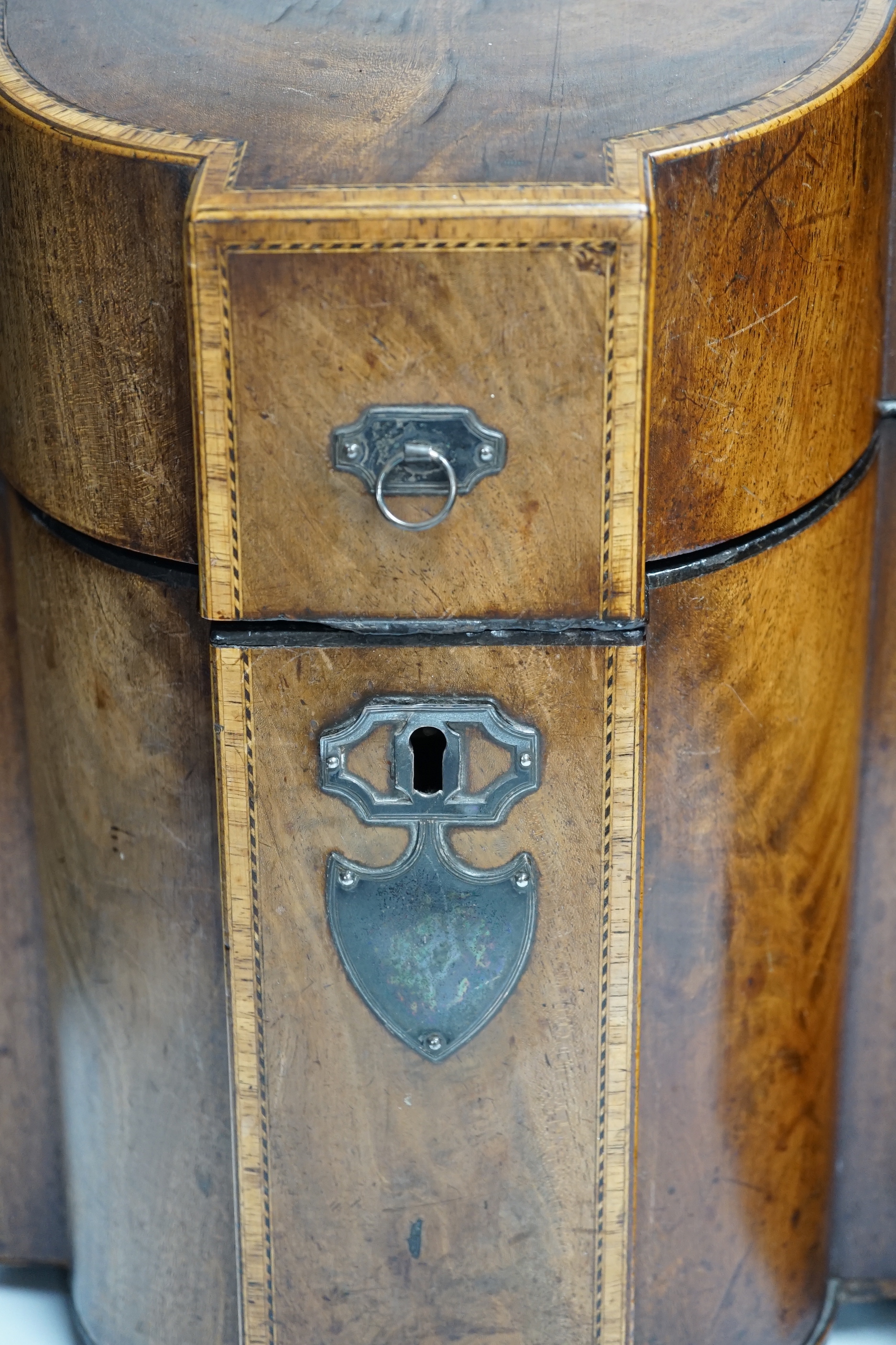 A pair of George III mahogany inlaid knife boxes with shield shaped lock plates (one converted), 38cm high